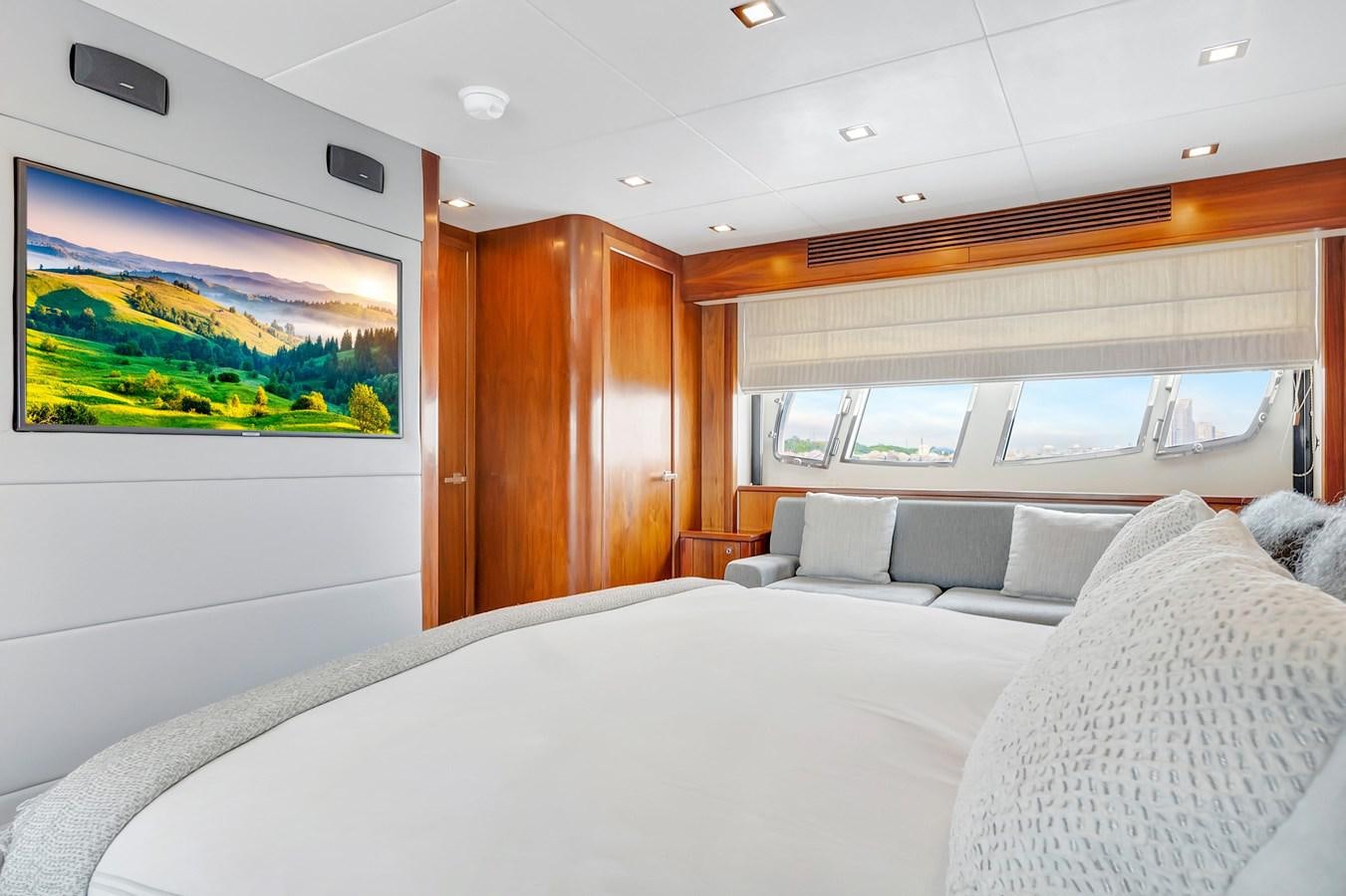 a bed in a room aboard QUATTRO Yacht for Sale