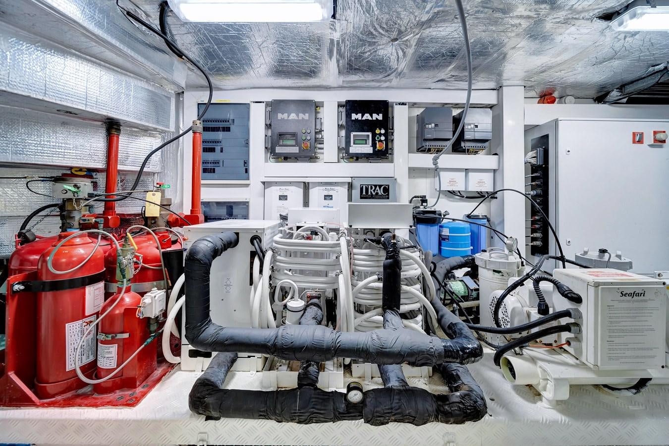 a room with machinery and equipment aboard QUATTRO Yacht for Sale