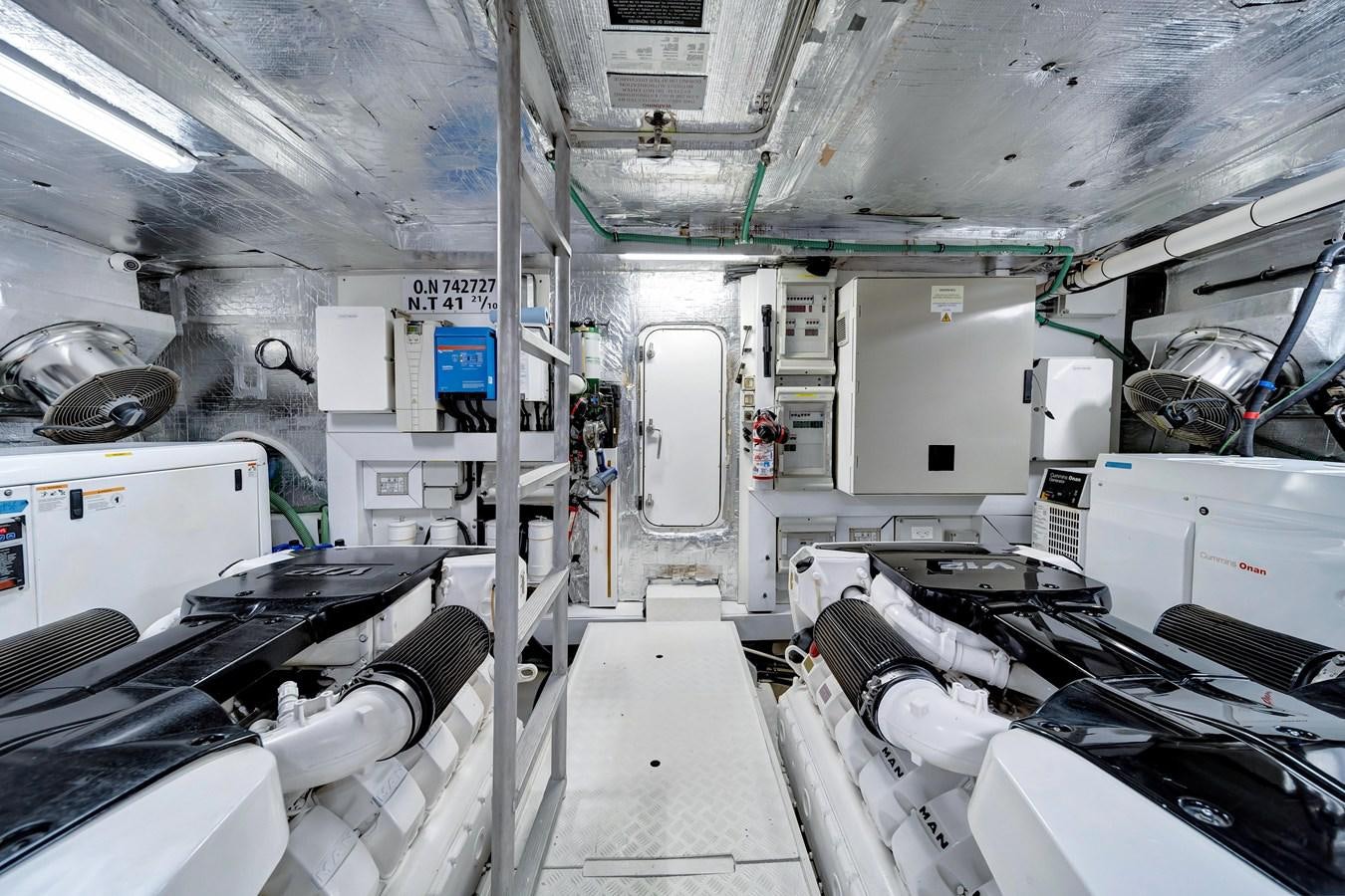 a large room with machinery aboard QUATTRO Yacht for Sale