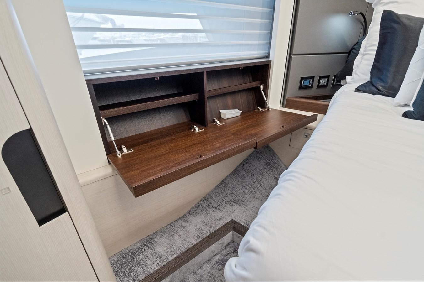 a bed with a tv on it aboard SAN PEDRO Yacht for Sale