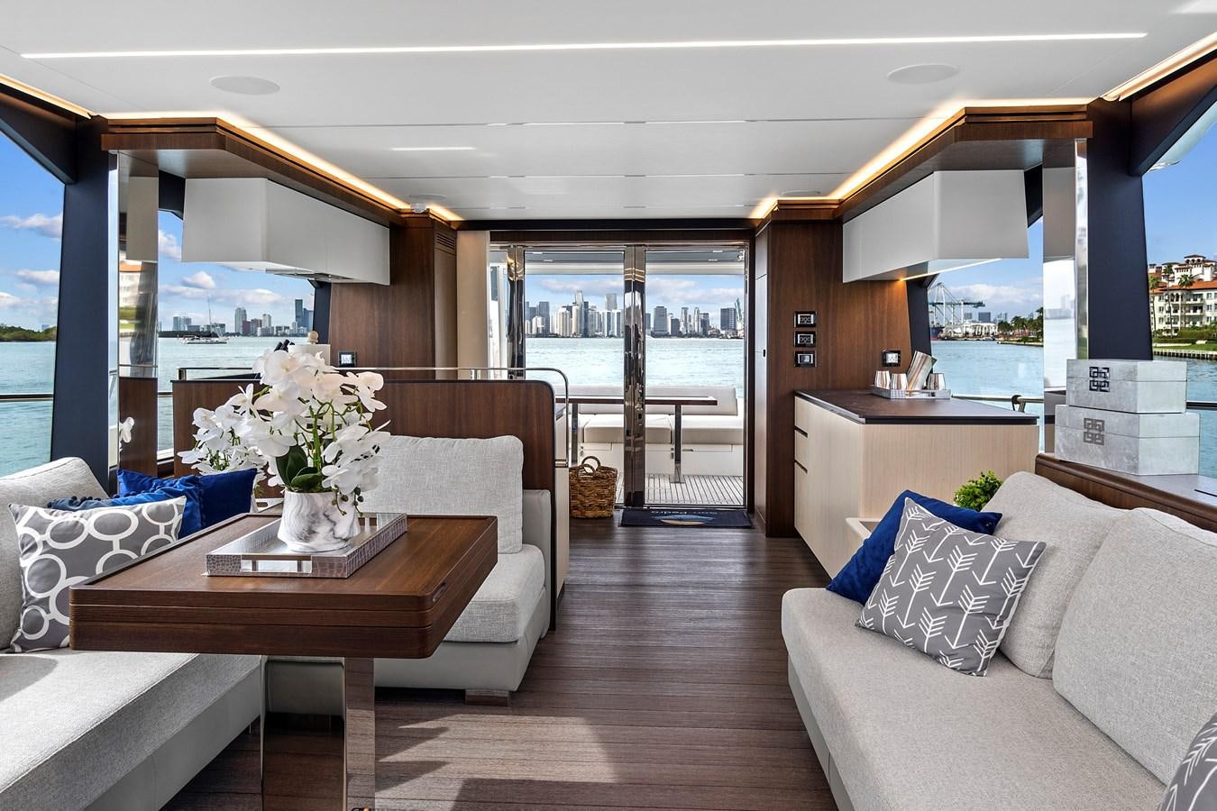a room with a table and couches aboard SAN PEDRO Yacht for Sale