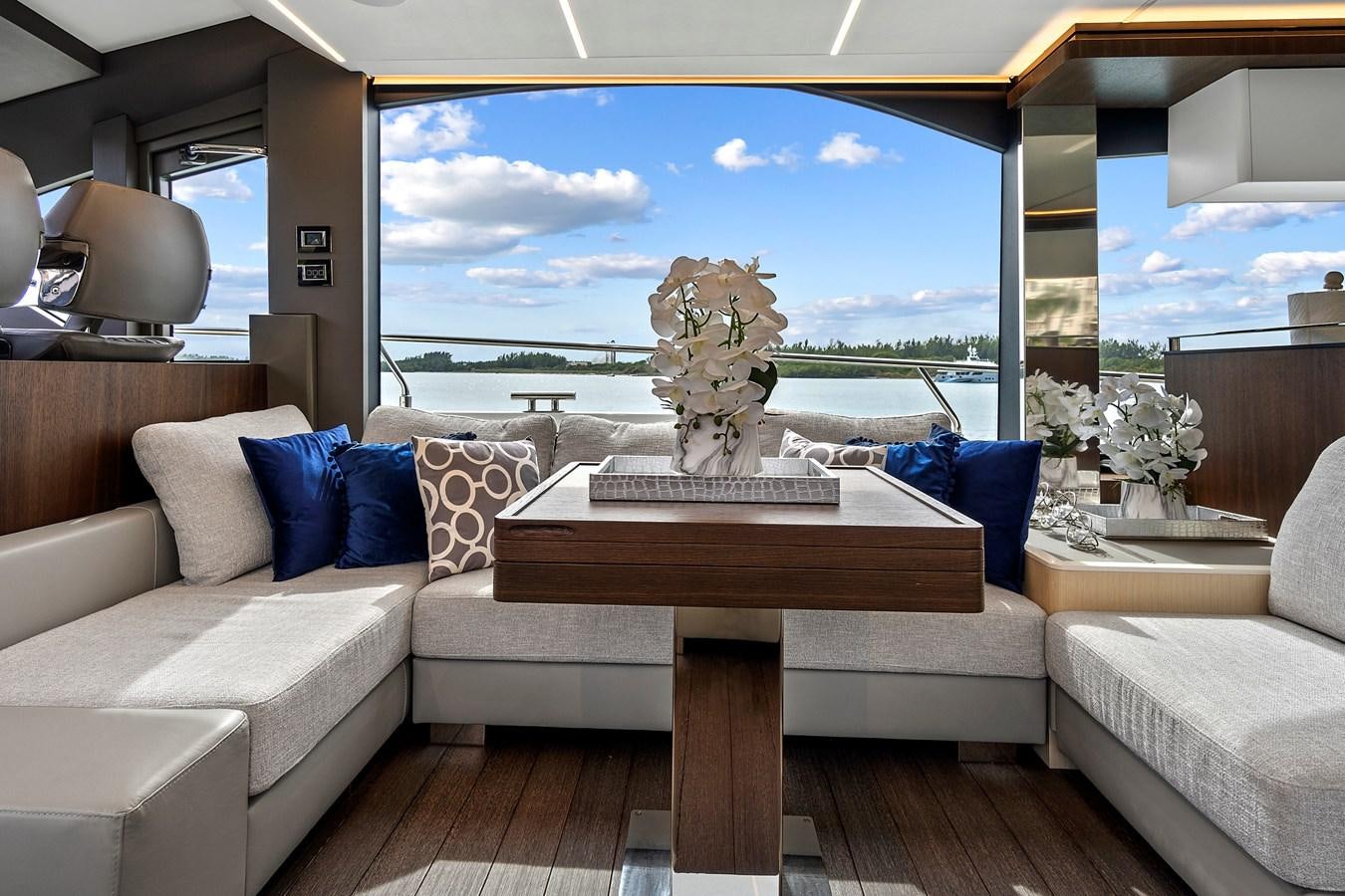 a living room with a large window aboard SAN PEDRO Yacht for Sale