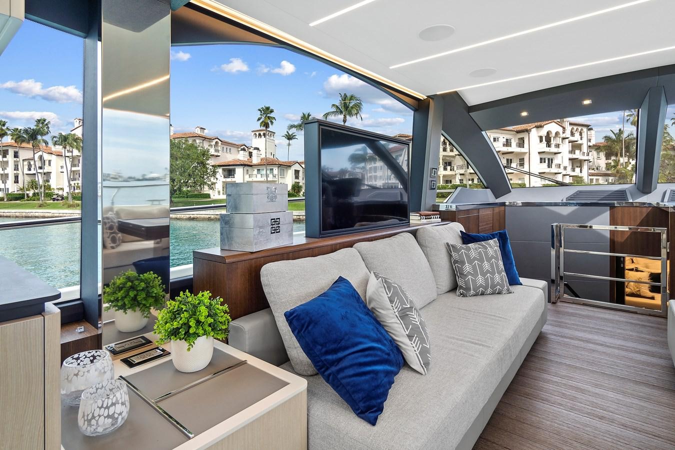 a living room with a large window aboard SAN PEDRO Yacht for Sale