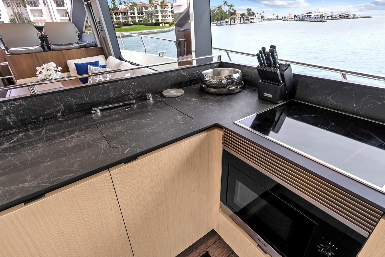 a kitchen with a sink and a grill aboard SAN PEDRO Yacht for Sale