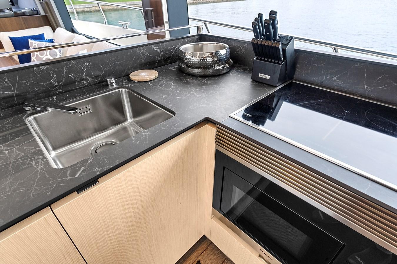 a kitchen with a stainless steel sink aboard SAN PEDRO Yacht for Sale