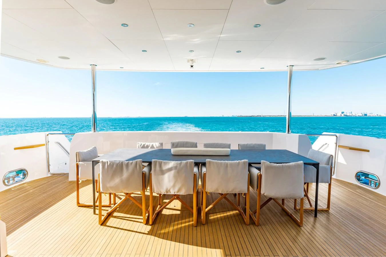 a table set for a dinner party aboard ADAGIO Yacht for Sale