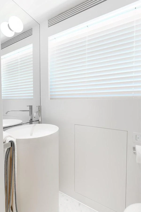 a bathroom with a sink and a mirror aboard ADAGIO Yacht for Sale
