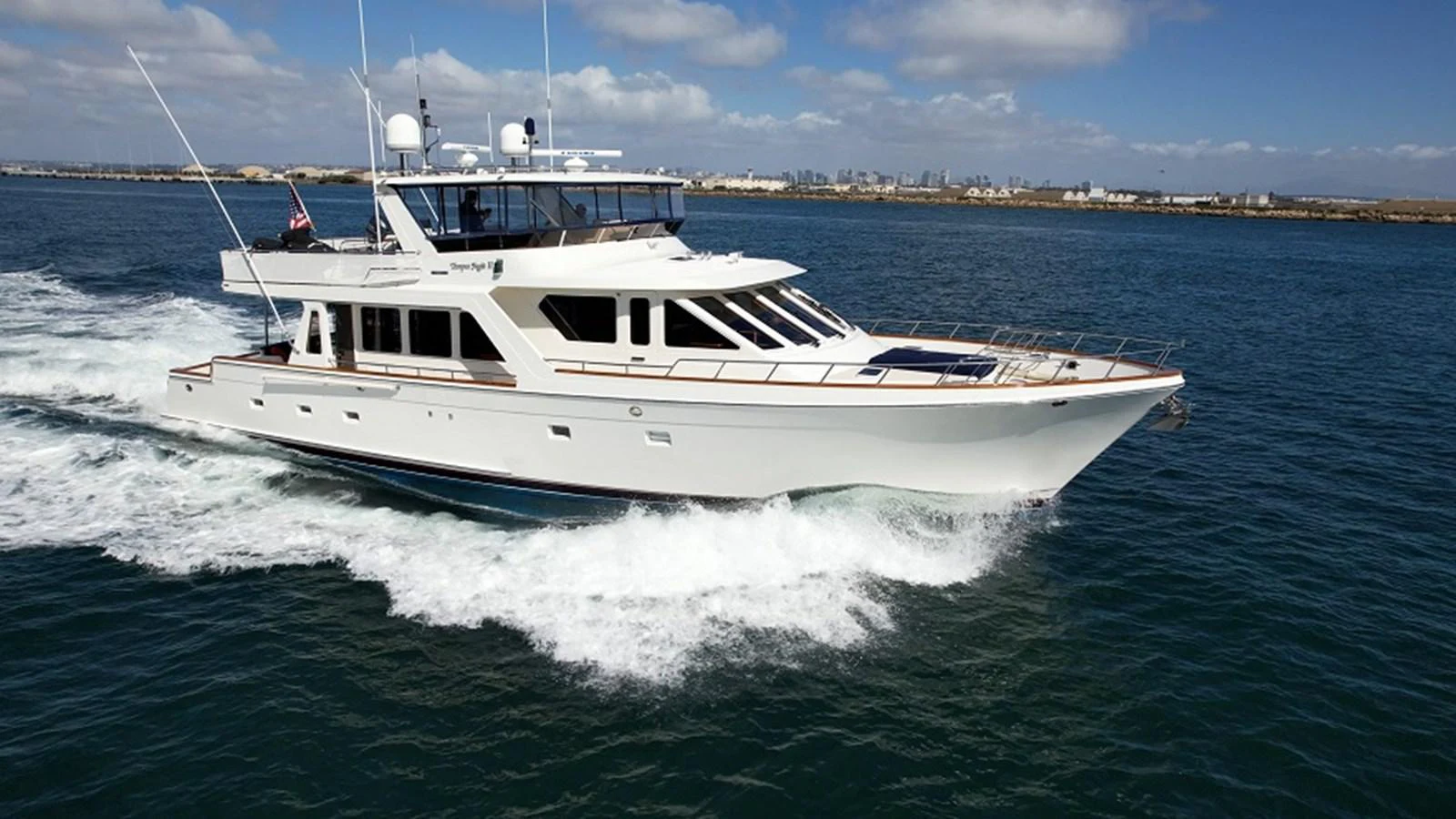 a white boat on the water aboard TEMPUS FUGIT II Yacht for Sale
