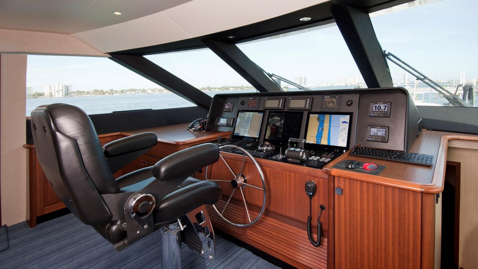 a leather chair in a car aboard MONCRII Yacht for Sale