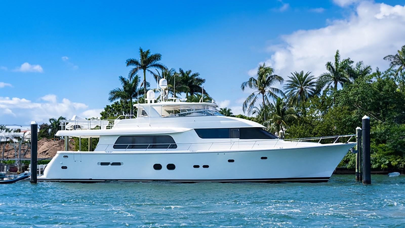 a white yacht in the water aboard MONCRII Yacht for Sale