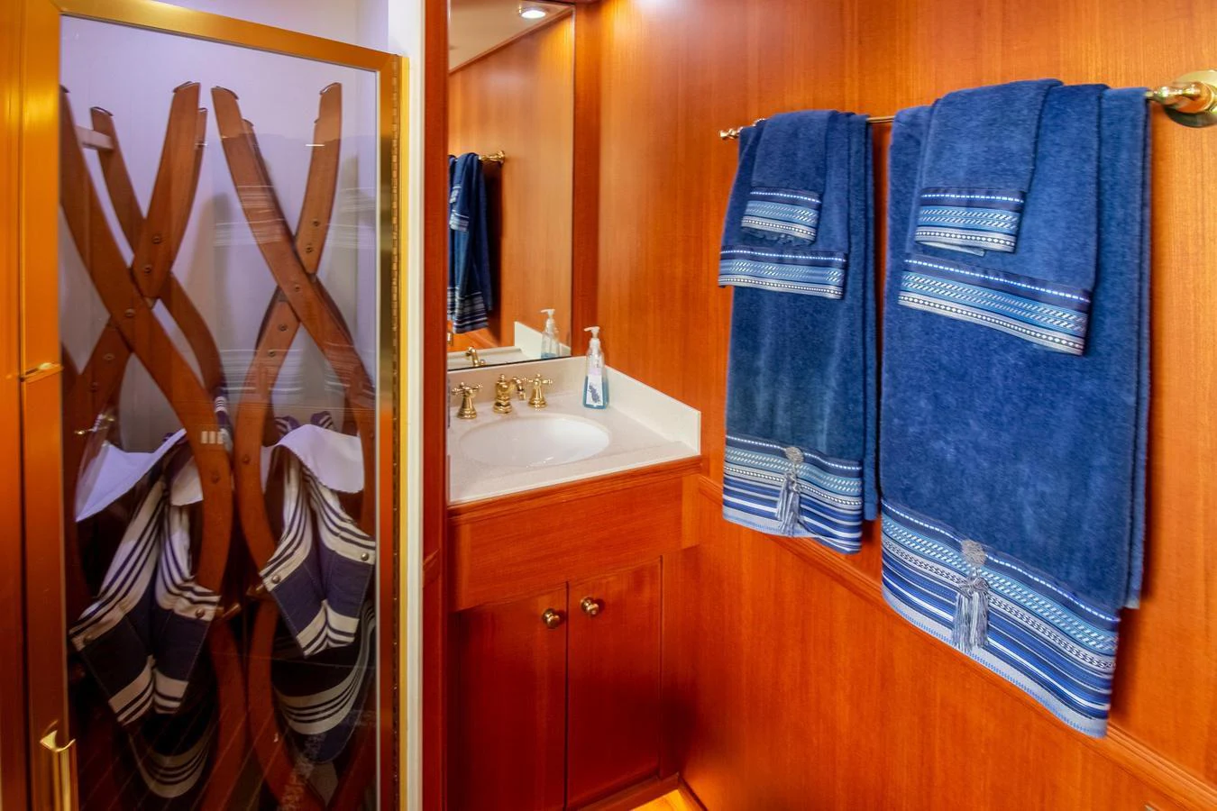 a bathroom with a towel on the wall aboard CHAIRMAN Yacht for Sale
