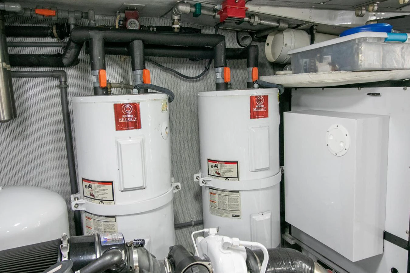 a group of white containers aboard CHAIRMAN Yacht for Sale