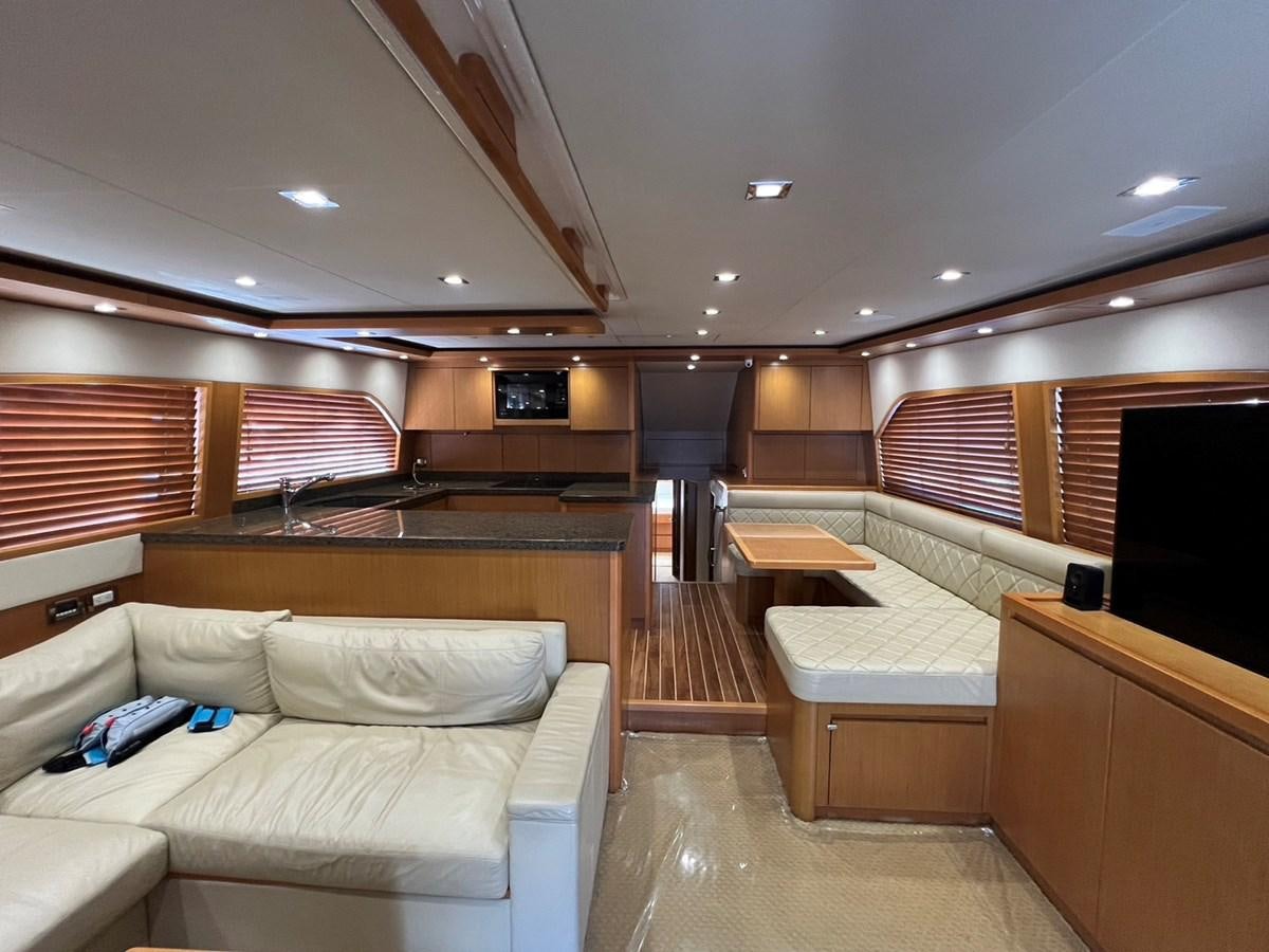 a room with a couch and a table aboard FORWARD Yacht for Sale