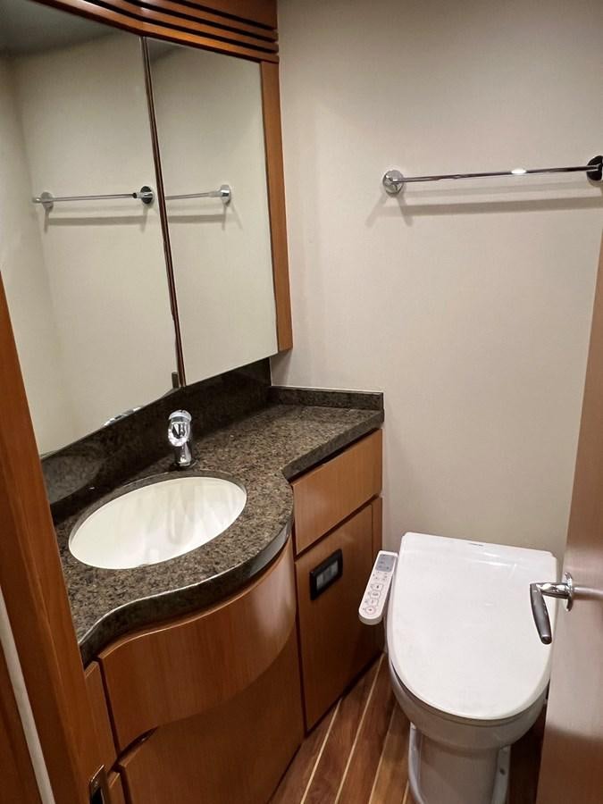 a bathroom with a sink and a toilet aboard FORWARD Yacht for Sale