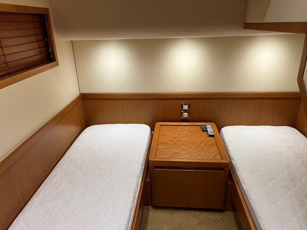 a couple of beds in a room aboard FORWARD Yacht for Sale