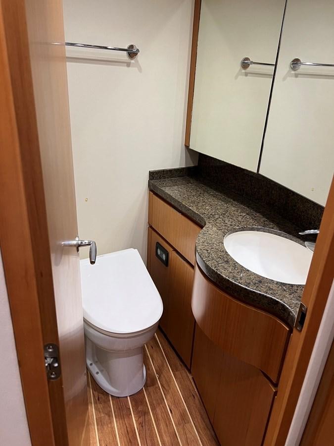 a bathroom with a sink and a toilet aboard FORWARD Yacht for Sale