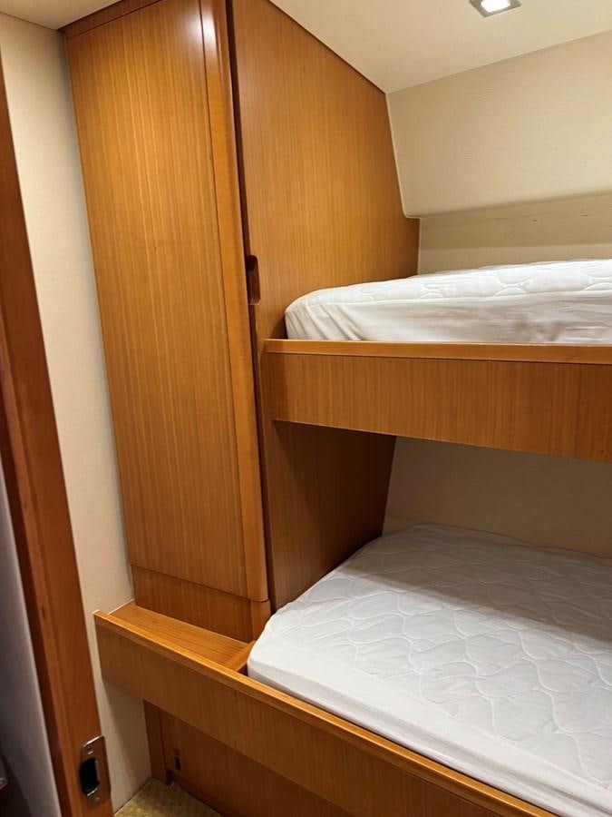 a couple of beds in a room aboard FORWARD Yacht for Sale