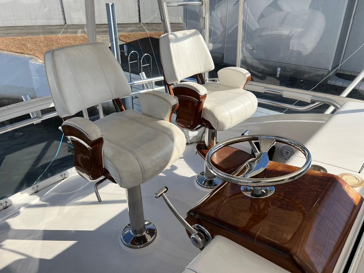 a group of chairs in a room aboard FORWARD Yacht for Sale