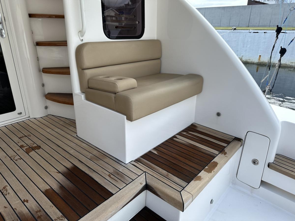 a white couch on a boat aboard FORWARD Yacht for Sale