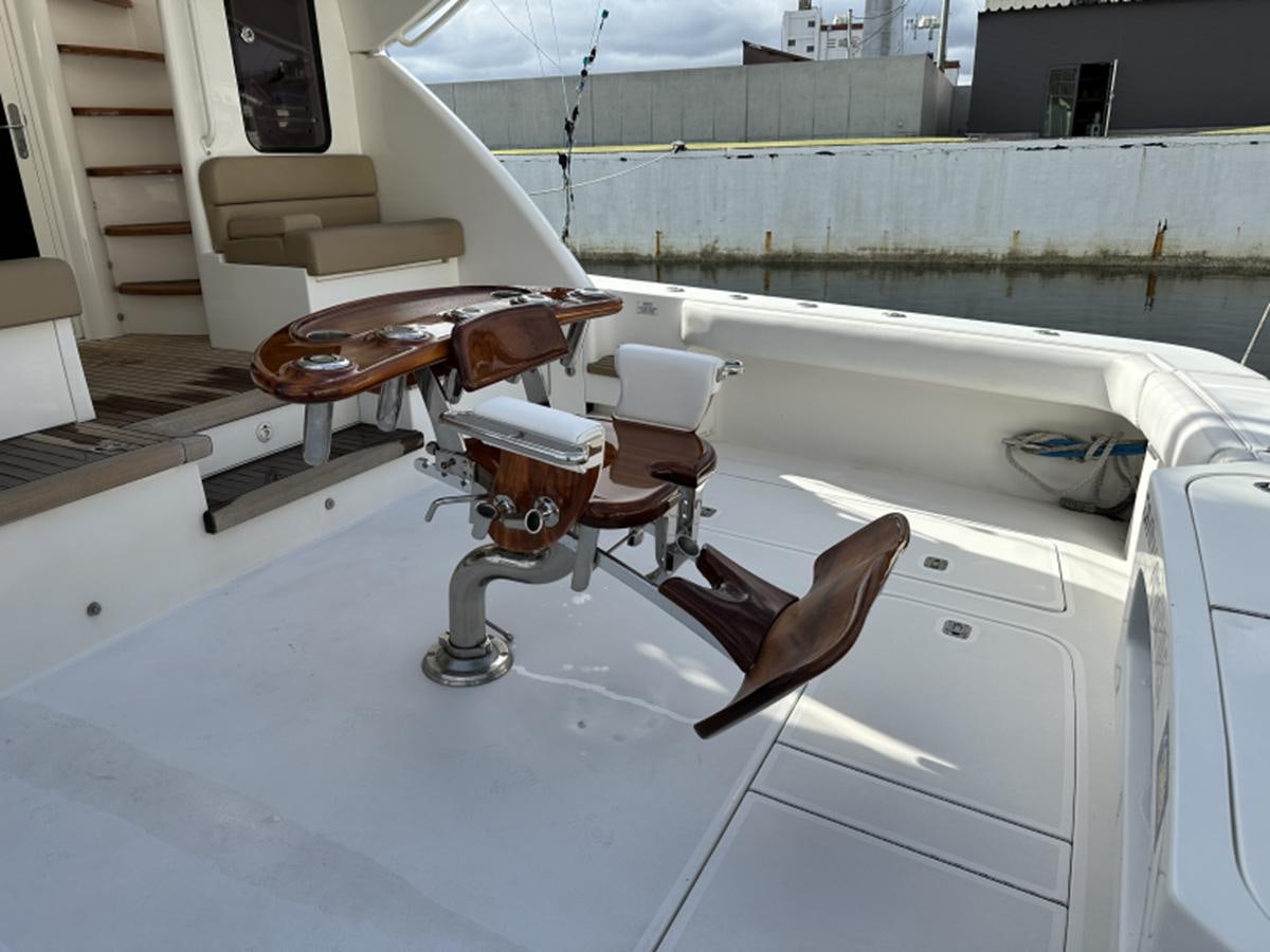 a wooden violin on a white surface aboard FORWARD Yacht for Sale