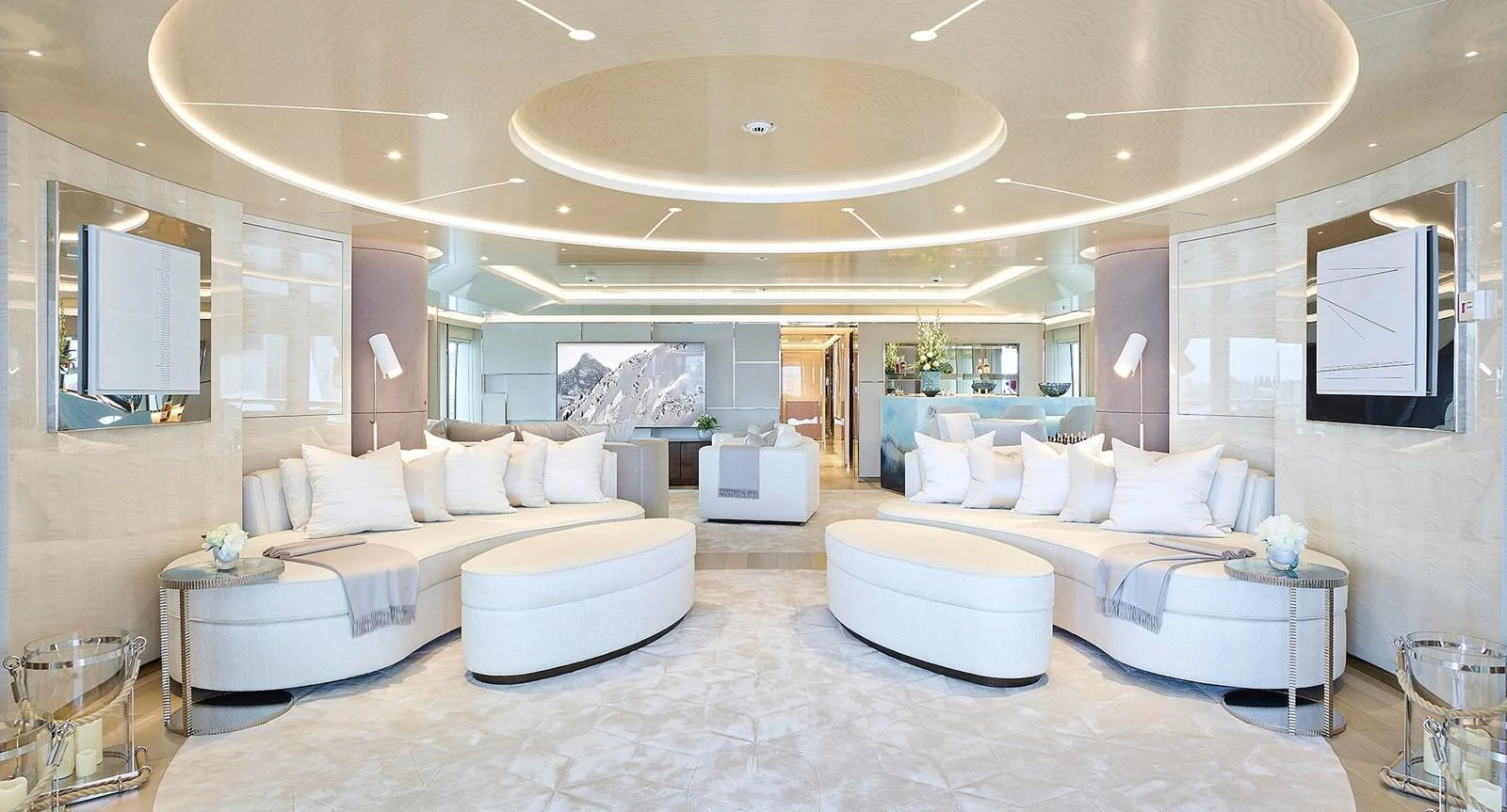 a large living room with a large white bed and a white couch aboard NEW SECRET Yacht for Sale