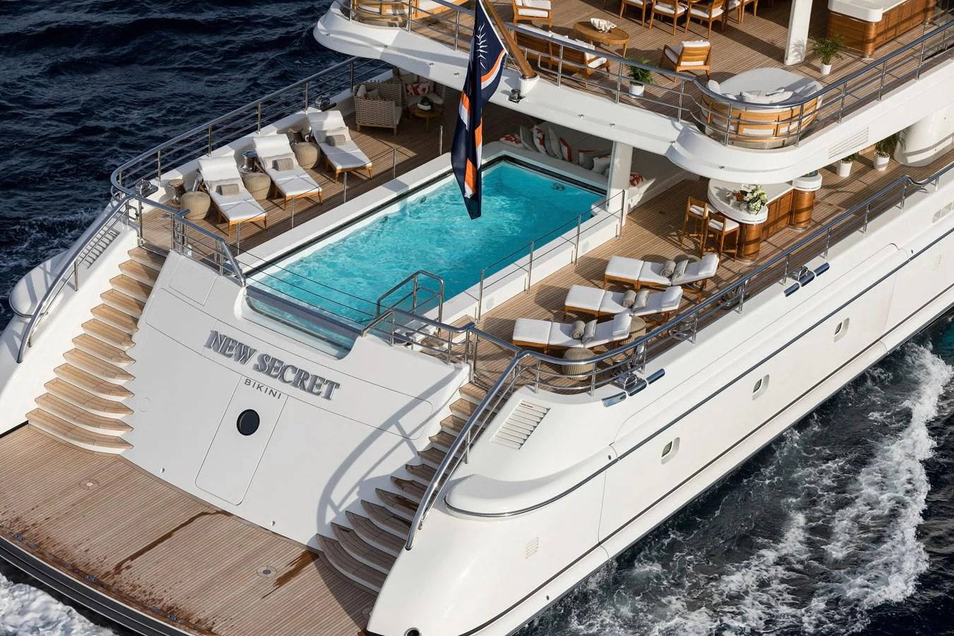 a large white ship docked aboard NEW SECRET Yacht for Sale