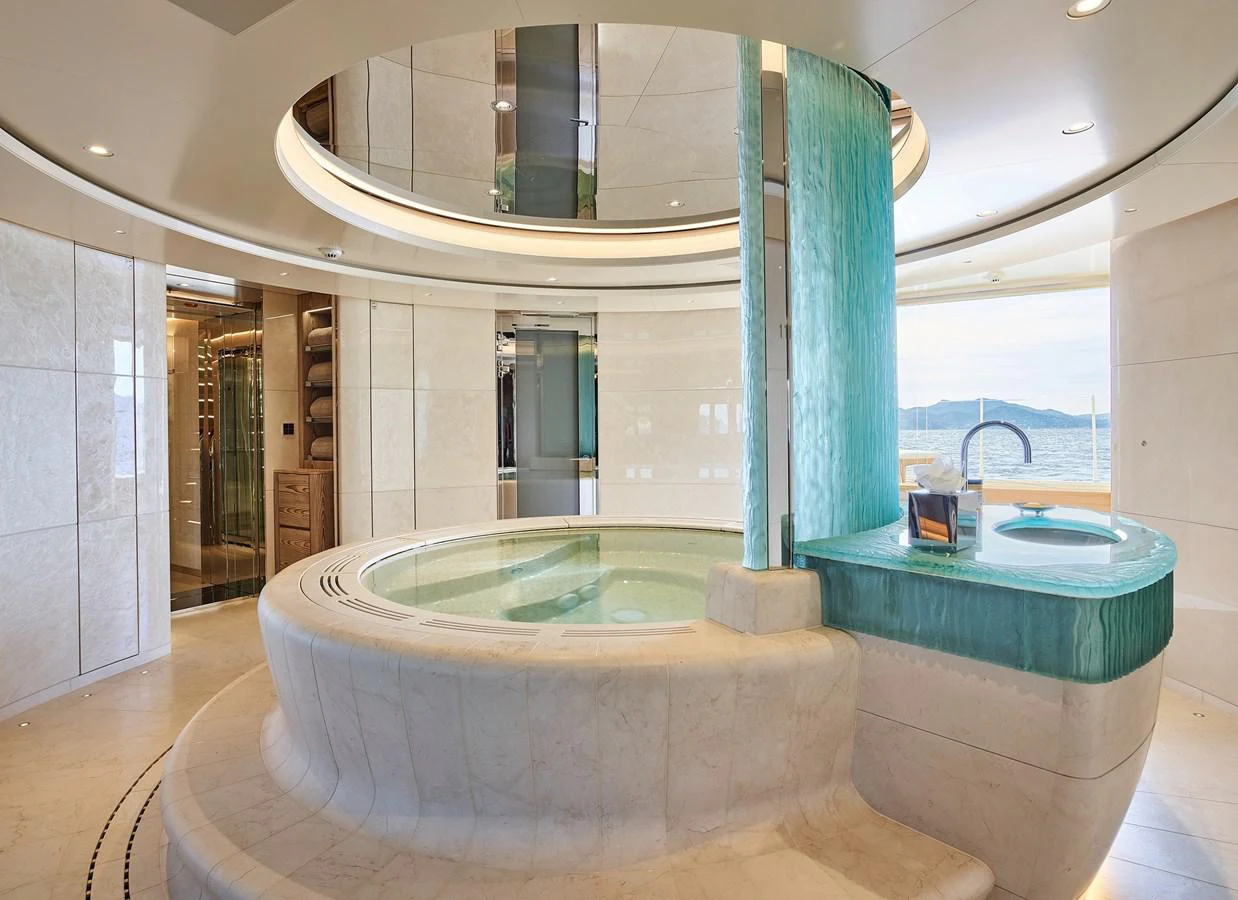 a large bathroom with a large jacuzzi aboard NEW SECRET Yacht for Sale