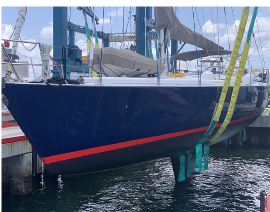 a boat docked in a harbor aboard FORTUNATO Yacht for Sale