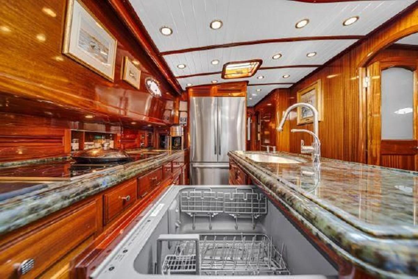 a kitchen with a large island aboard TRUANT Yacht for Sale