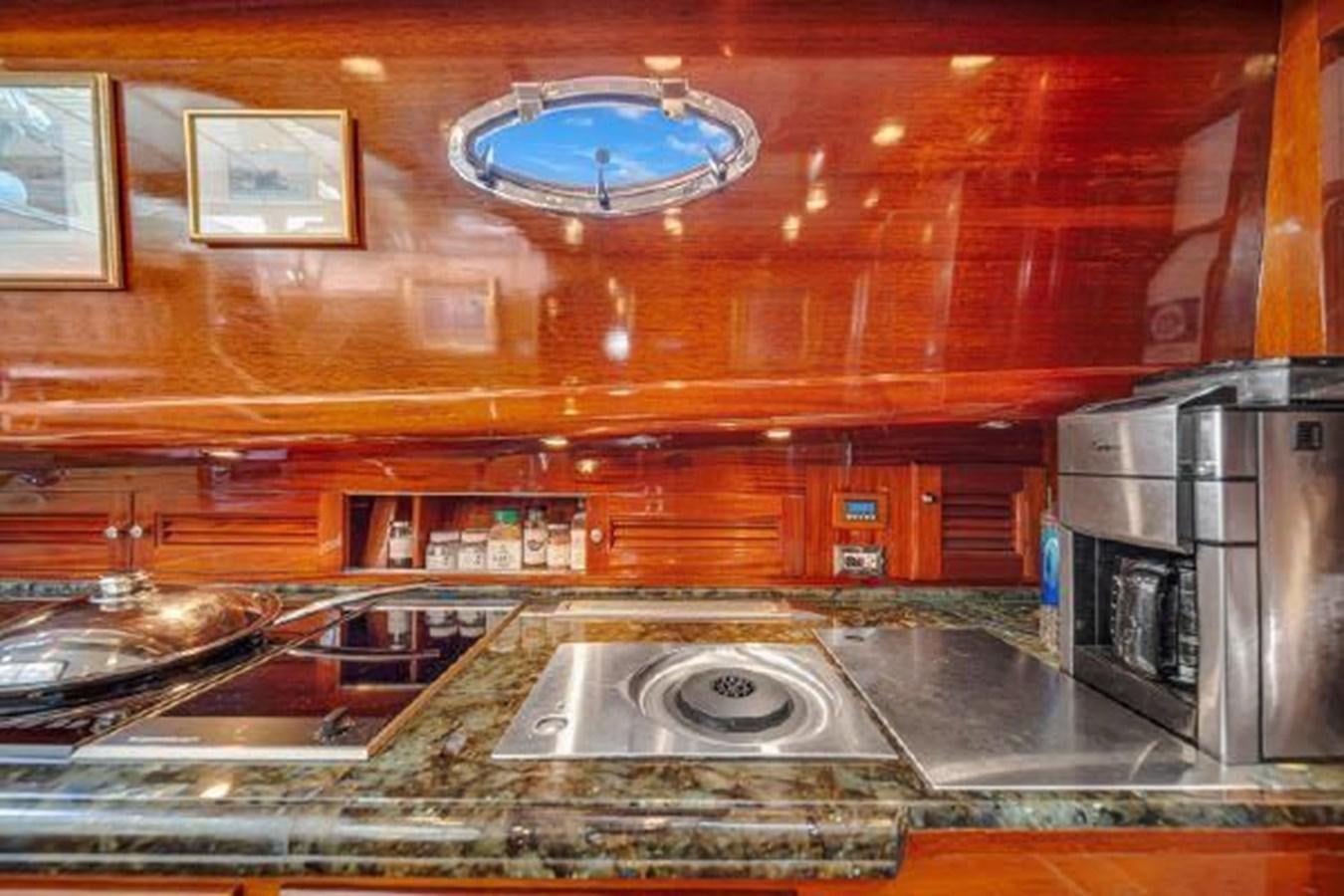 a kitchen with a large glass ceiling aboard TRUANT Yacht for Sale