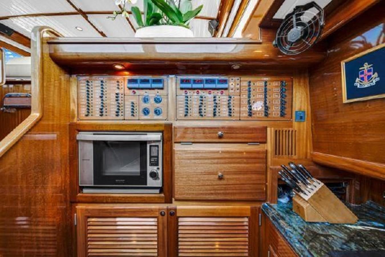a tv on a cabinet aboard TRUANT Yacht for Sale