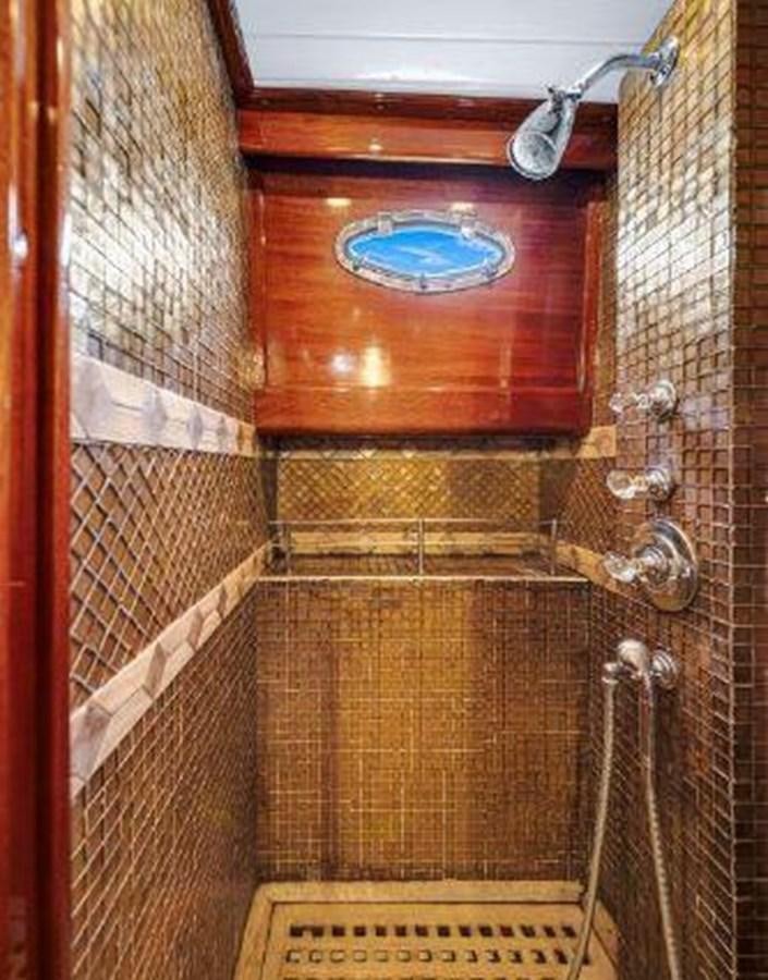 a bathroom with a shower and a sink aboard TRUANT Yacht for Sale
