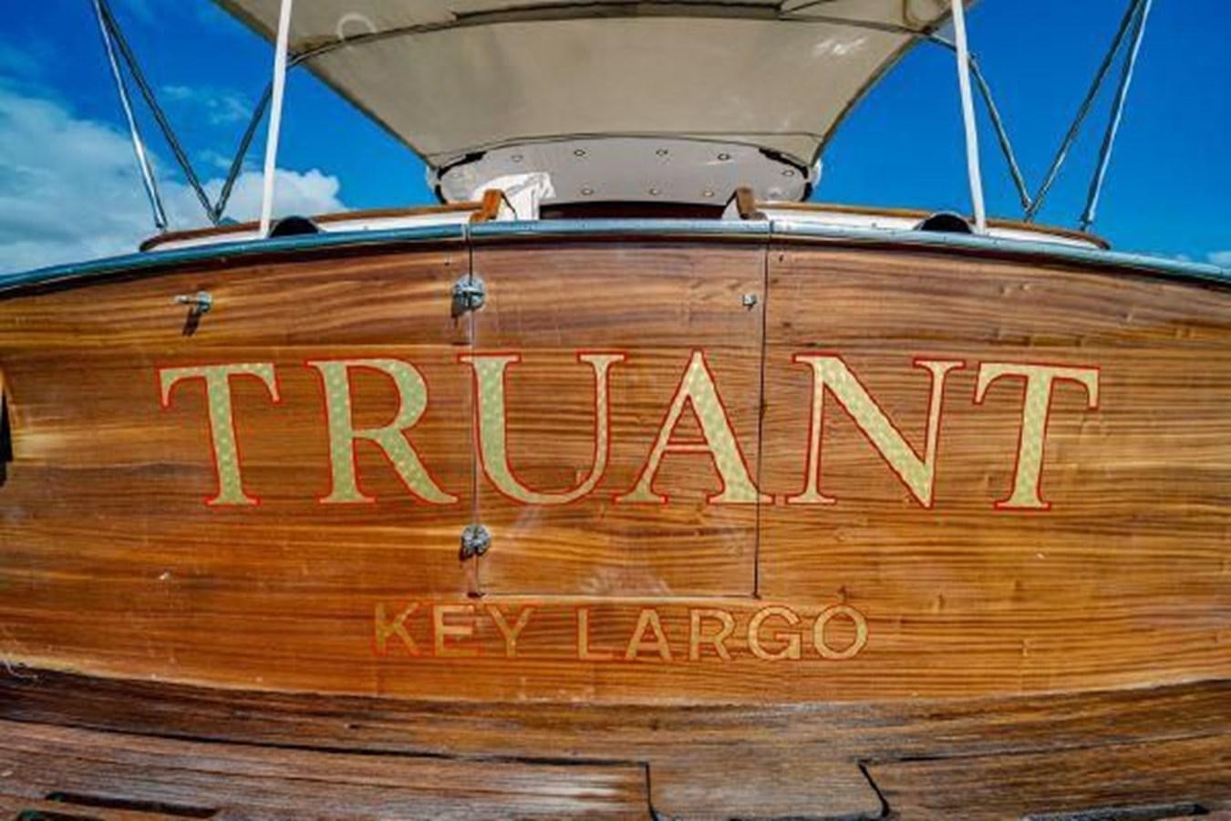 a wooden sign with a message aboard TRUANT Yacht for Sale