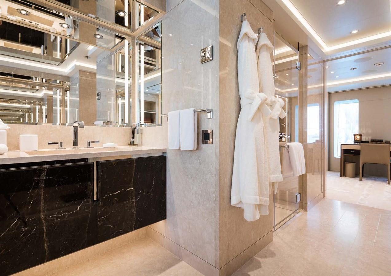 a bathroom with a large marble counter aboard STELLA MI Yacht for Sale