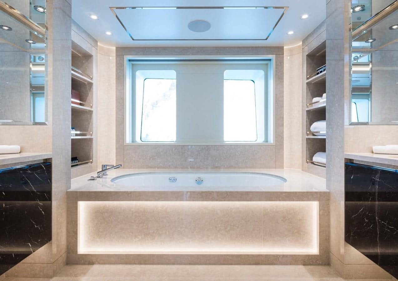 a large bathroom with a large jacuzzi tub aboard STELLA MI Yacht for Sale