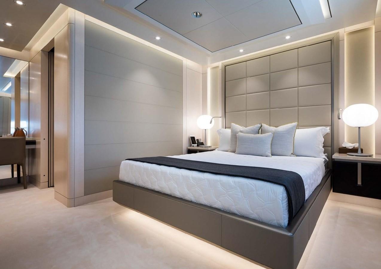 a large bed in a room aboard STELLA MI Yacht for Sale