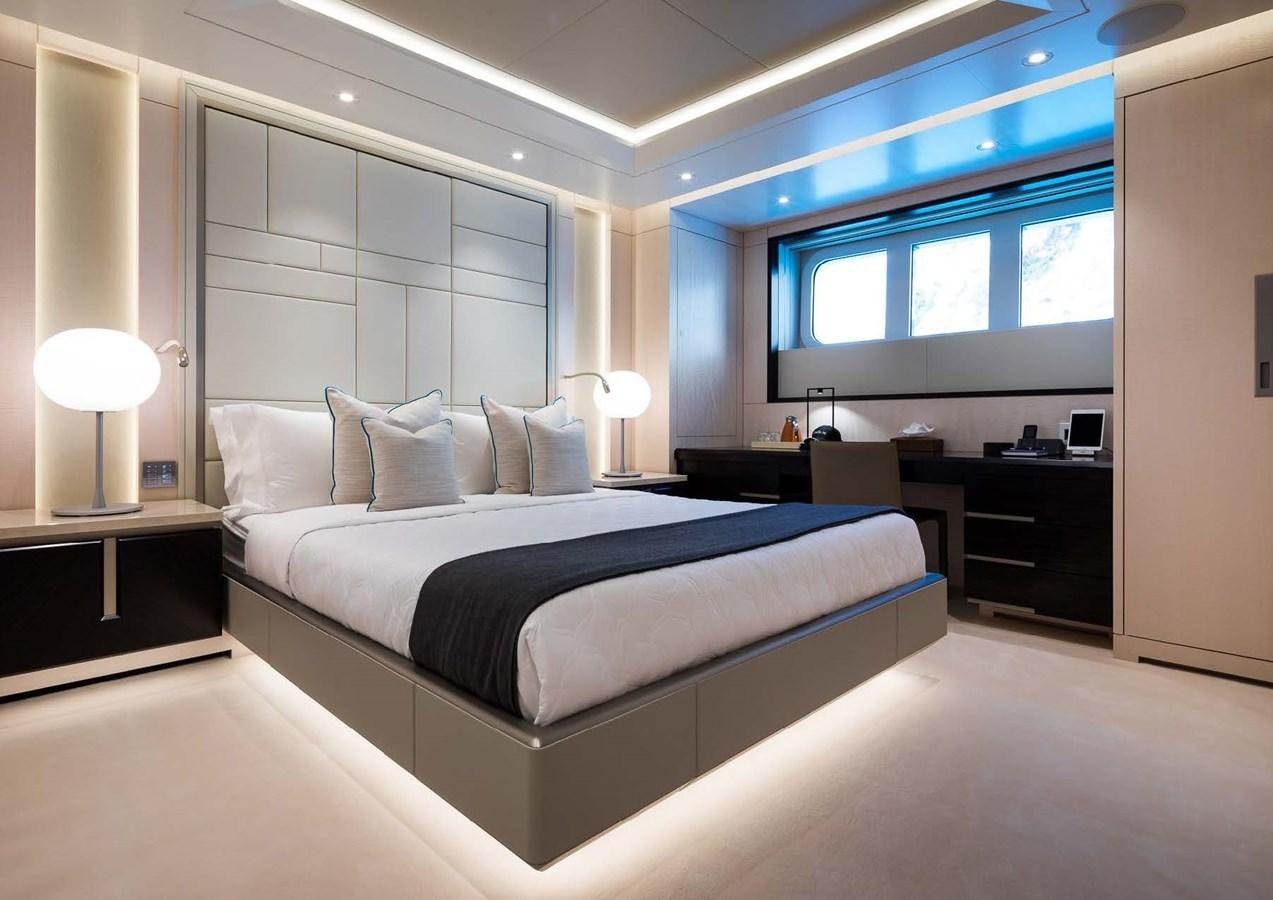 a large bed in a room aboard STELLA MI Yacht for Sale