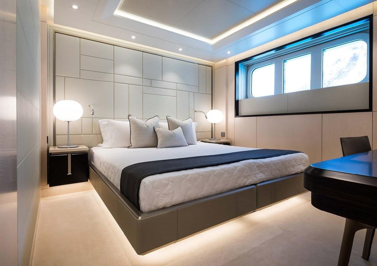 a large bed in a room aboard STELLA MI Yacht for Sale