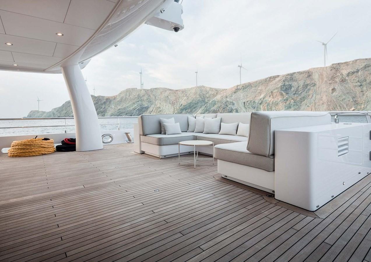a room with a couch and a table aboard STELLA MI Yacht for Sale