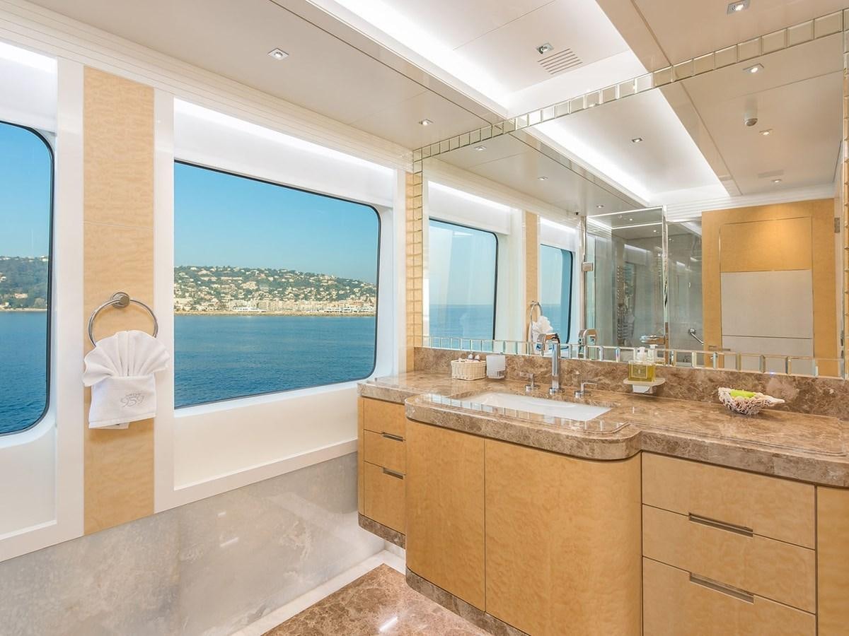 a bathroom with a large window aboard JADE 959 Yacht for Sale