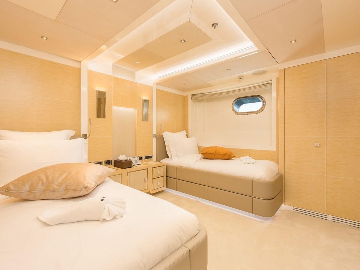 a room with two beds aboard JADE 959 Yacht for Sale