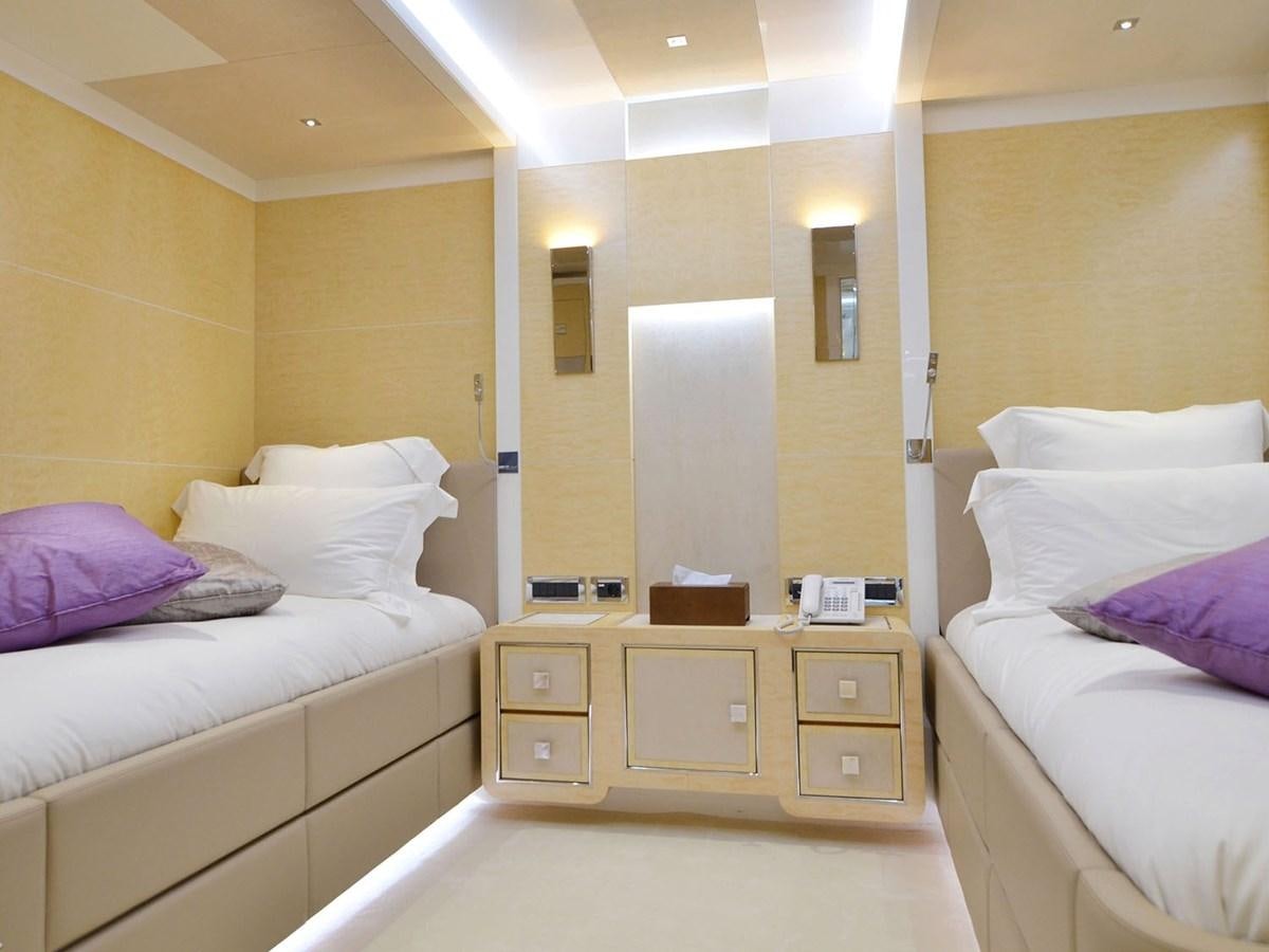 a room with two beds aboard JADE 959 Yacht for Sale