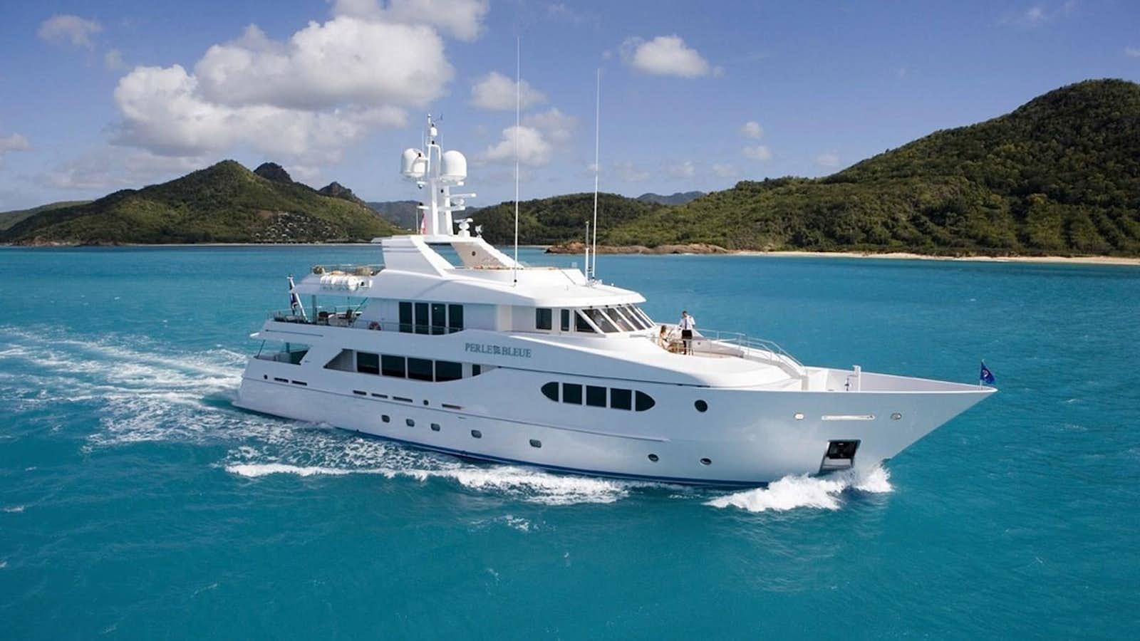 a boat on the water aboard PERLE BLEUE Yacht for Sale