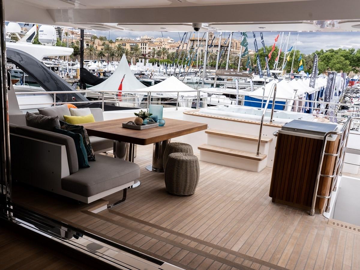 a room with a table and chairs aboard NIXTUN Yacht for Sale
