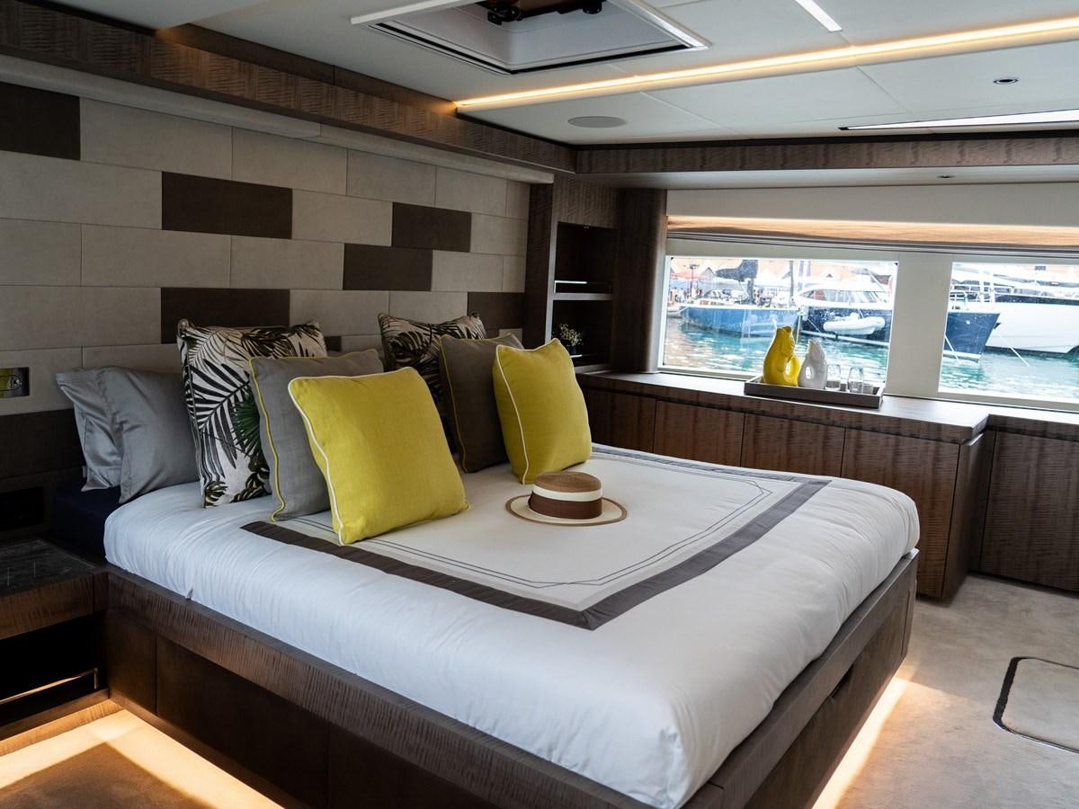 a bed with pillows aboard NIXTUN Yacht for Sale