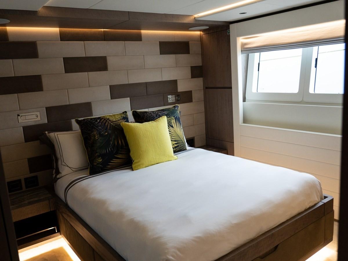 a bed with pillows aboard NIXTUN Yacht for Sale