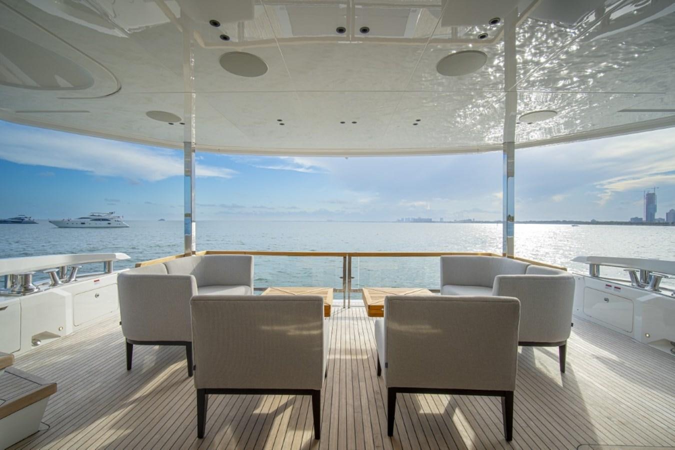 a room with chairs and a table aboard SUNSEEKER 90/25 Yacht for Sale