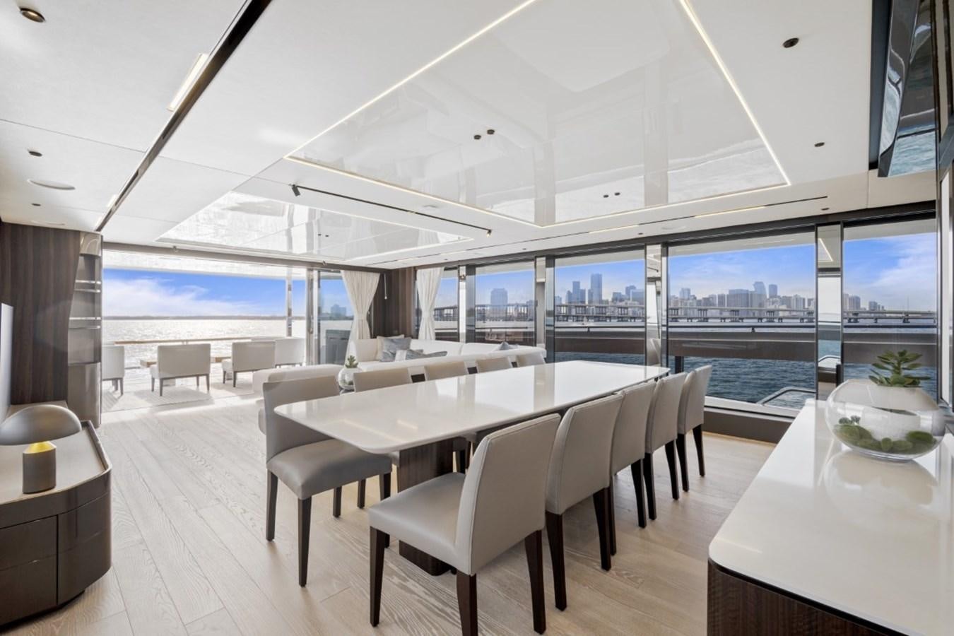 a room with a table and chairs aboard SUNSEEKER 90/25 Yacht for Sale