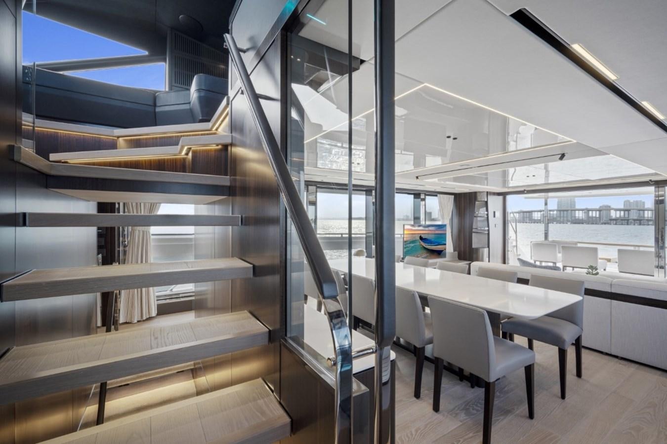 a room with a large glass wall aboard SUNSEEKER 90/25 Yacht for Sale