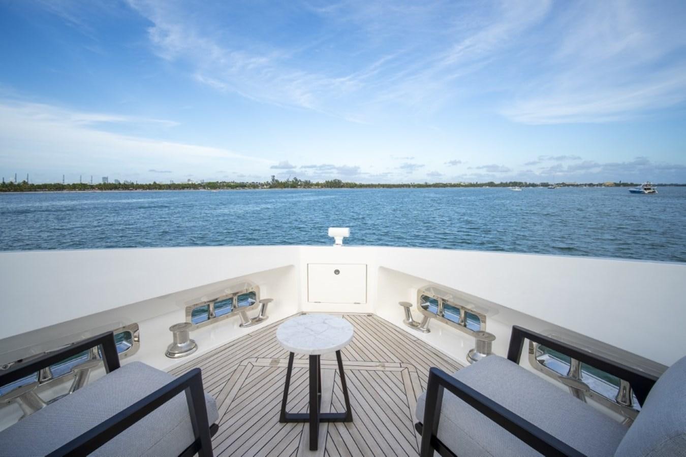 a large white building with a balcony overlooking a body of water aboard SUNSEEKER 90/25 Yacht for Sale